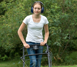 Garden girl mowing