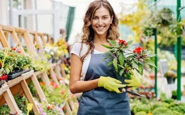 Garden woman with flowerpot